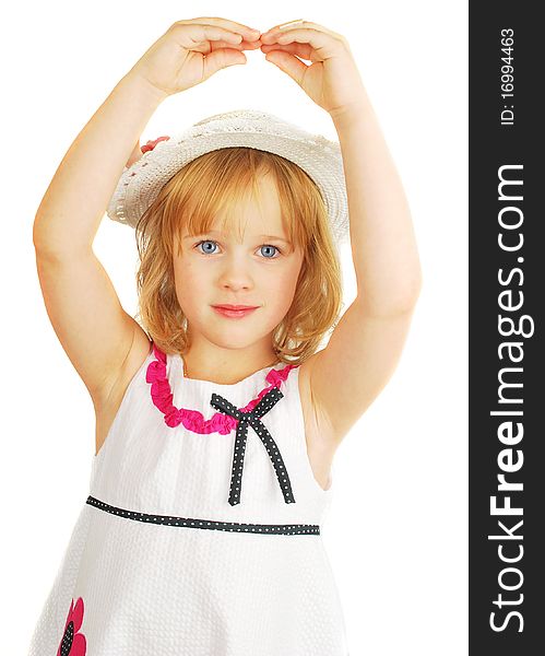 Cute little girl in hat and nice dress dancing with hands, isolated on the white background portrait, studio shoot. Cute little girl in hat and nice dress dancing with hands, isolated on the white background portrait, studio shoot.