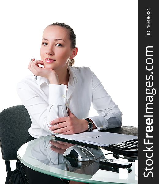 Businesswoman sits at the computer