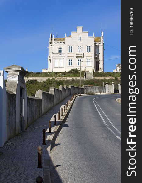 View of the old marble cottage Palacete Almeida Araujo a classic landmark in the Lagoa de Obidos lagoon beach, at Foz do Arelho, Silver Coast, Portugal