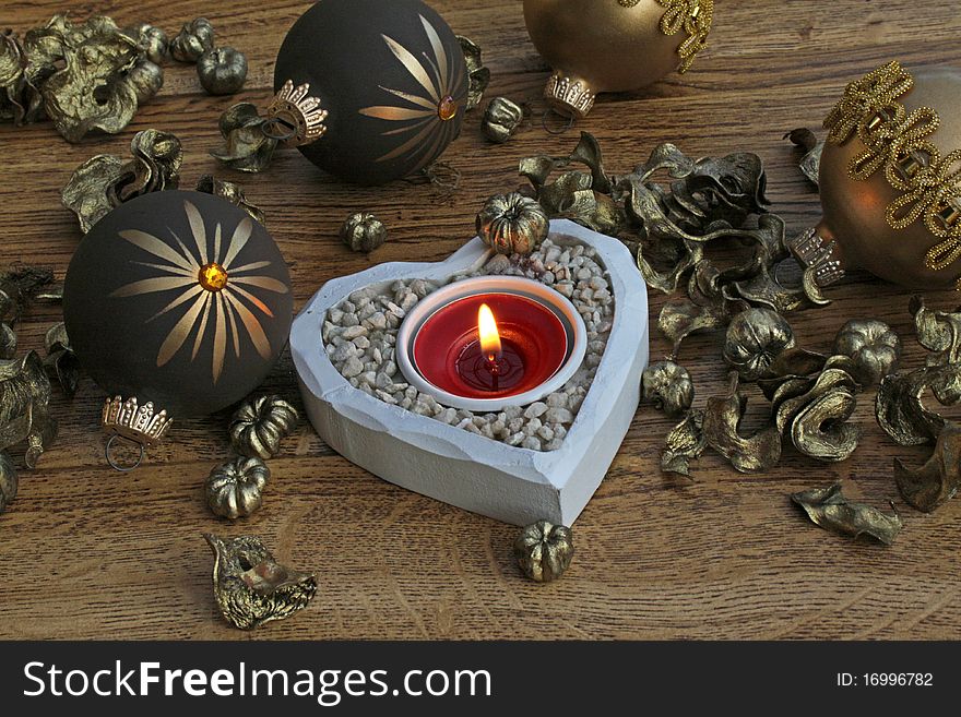 Burning candle with christmas decoration. Burning candle with christmas decoration