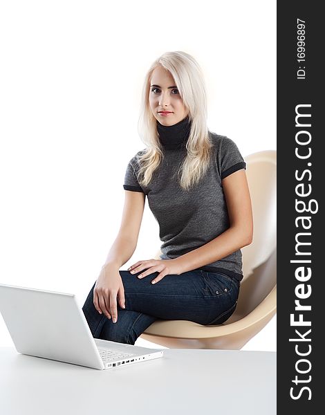 Beautiful woman with computer over white background. Beautiful woman with computer over white background