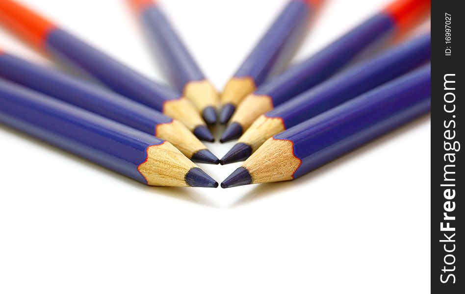 Colour pencils isolated on white background close up