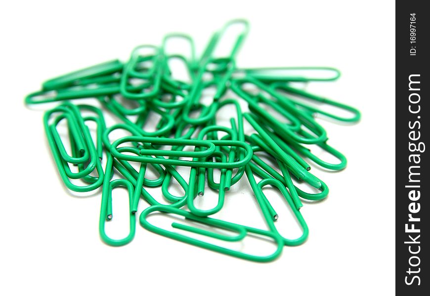 Color paper clips to background. Isolated on white background