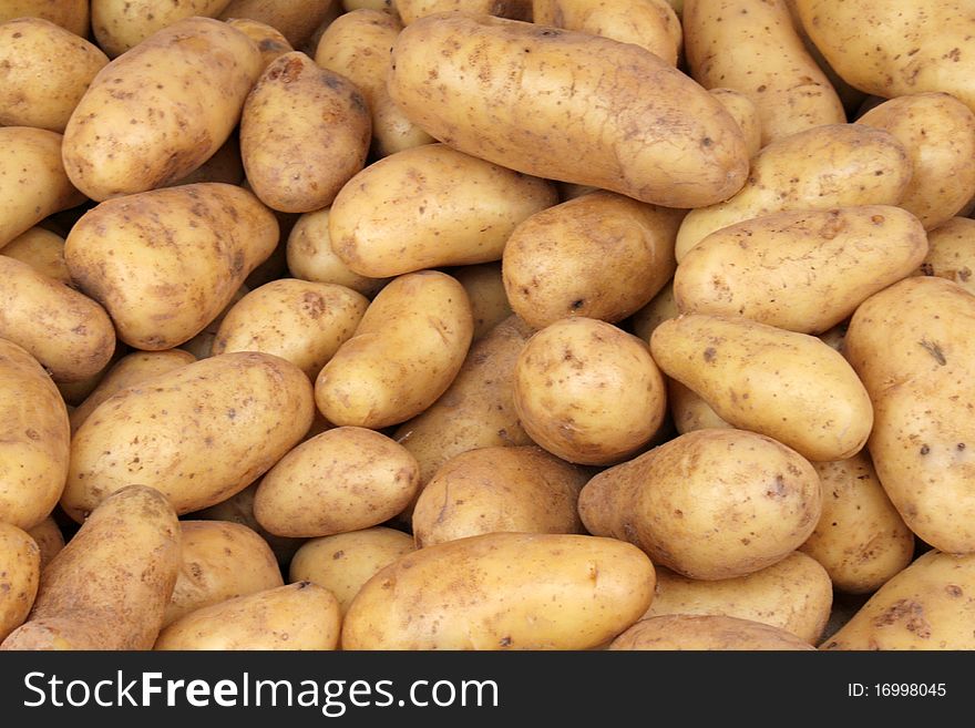 Freshly harvested potatoes from the weekly market