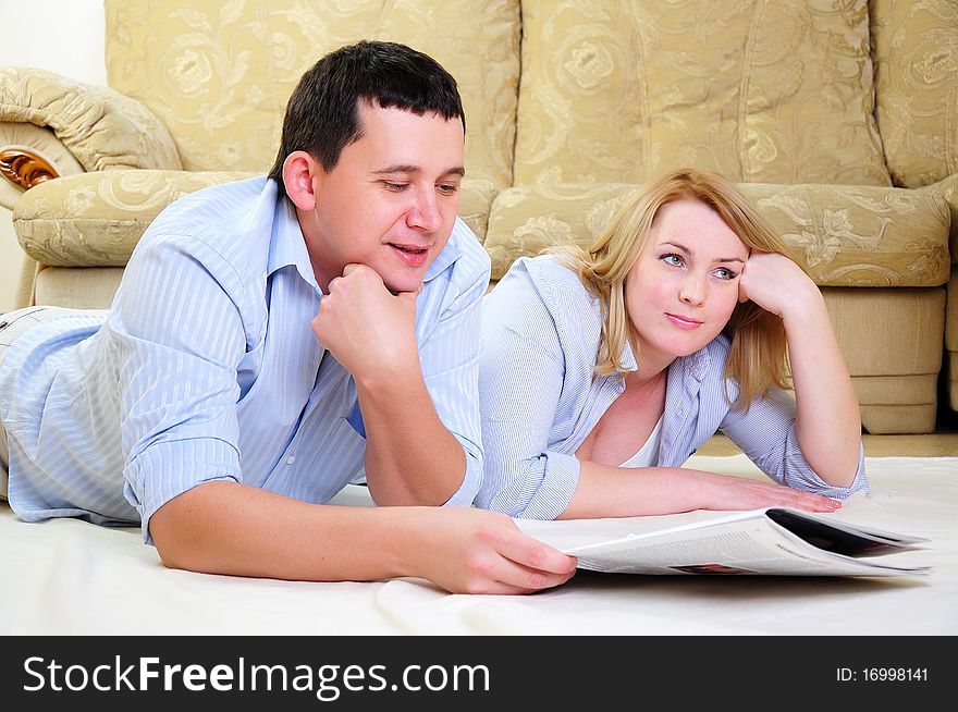 A young couple spends time together in the interior