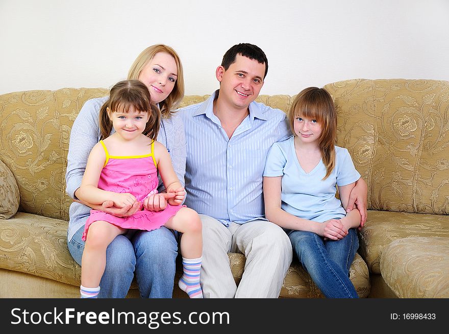 Mom, Dad and their two daughters to spend time together, socialize and enjoy life