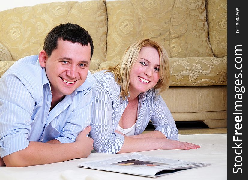 A young couple spends time together in the interior