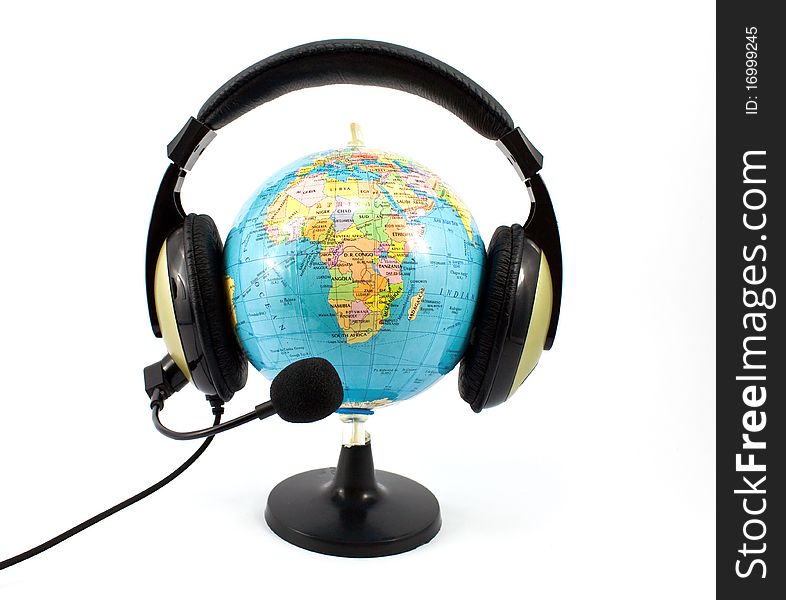 Globe and headphones isolated on white background
