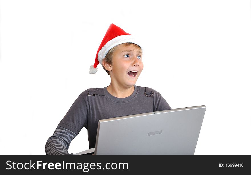 Scary adorable child with Santa Hat and with notebook