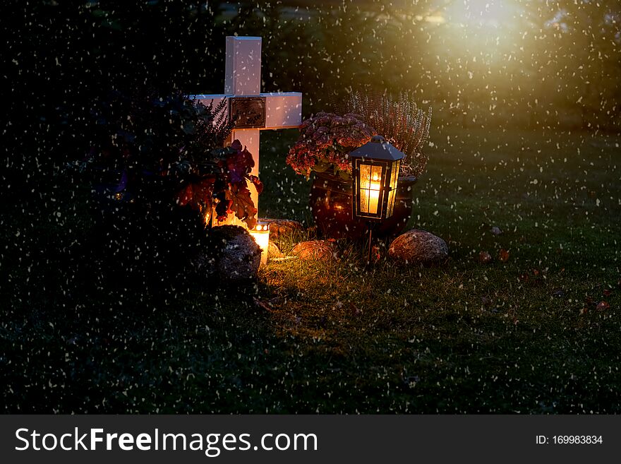 Cemetery with many candels. Halloween.