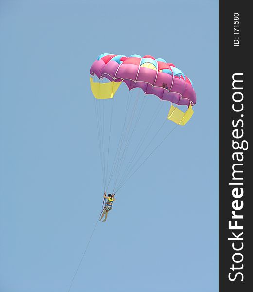 Colorful parasailor in the air. Colorful parasailor in the air
