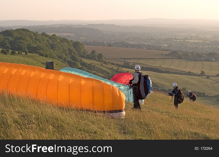 3 paragliders about to take off. 3 paragliders about to take off