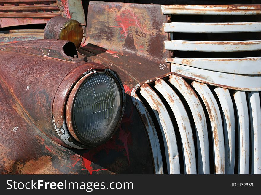 Headlight of an old, rusting chevy truck. focus on headlight. Headlight of an old, rusting chevy truck. focus on headlight.