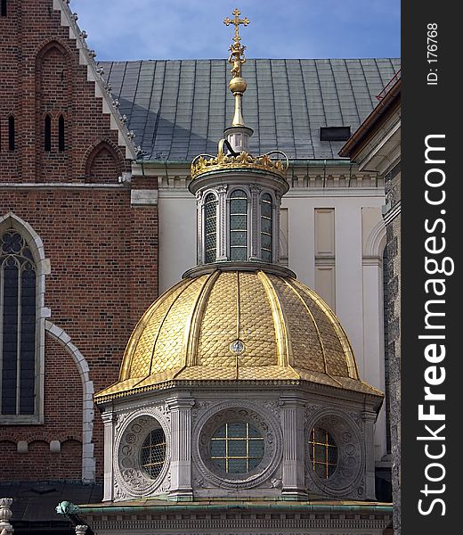 Golden dome of one of the two Royal Chapels at the Wawel castle in Krakow