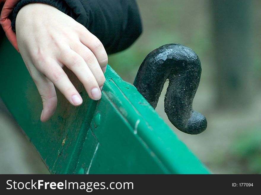 Hand on a bench