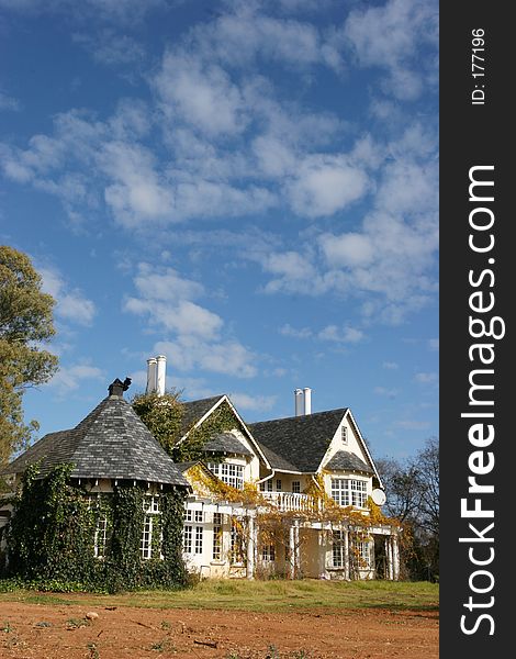 Country style house with a lovely blue sky