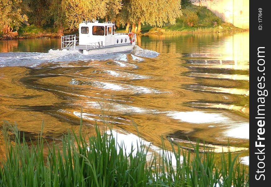 Ship on a golden river