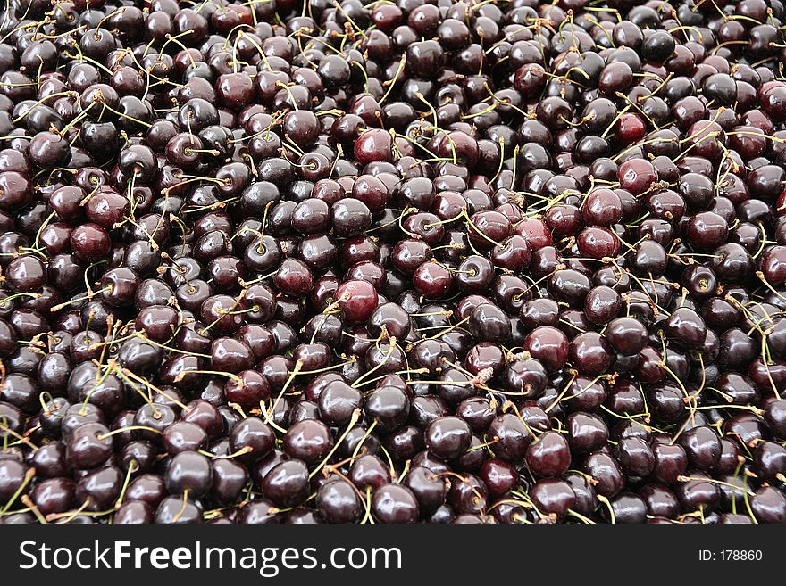 Background of dark cherries. Background of dark cherries