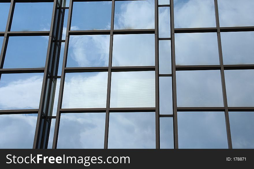 Reflection of clouds in building