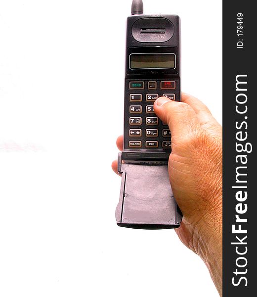 A hand holding a cell phone over white. A hand holding a cell phone over white