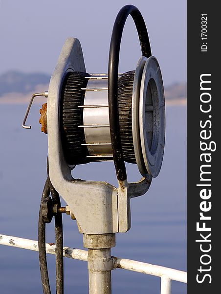 Fishing winch on small fishing boat. Croatia. Fishing winch on small fishing boat. Croatia