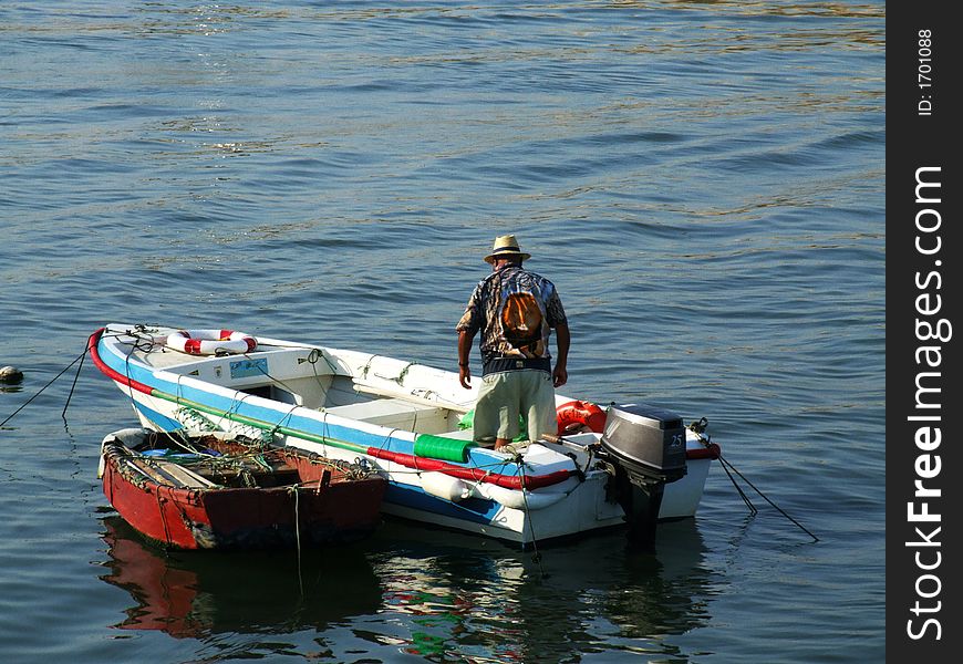 Fisherman preparing its boat for sea