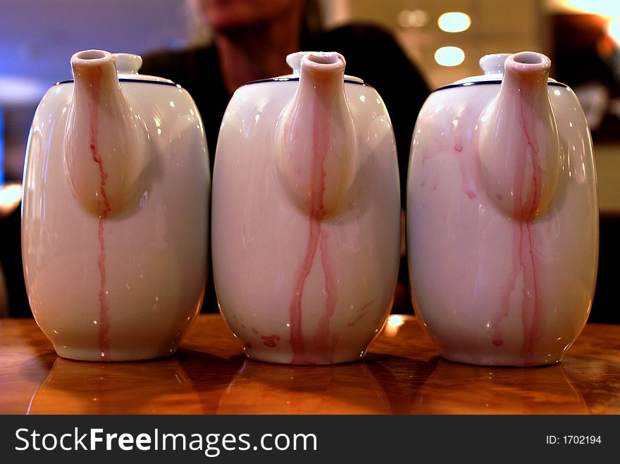 Three stained mulled wine pitchers