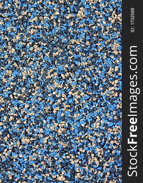 A blue and tan speckled background. A blue and tan speckled background