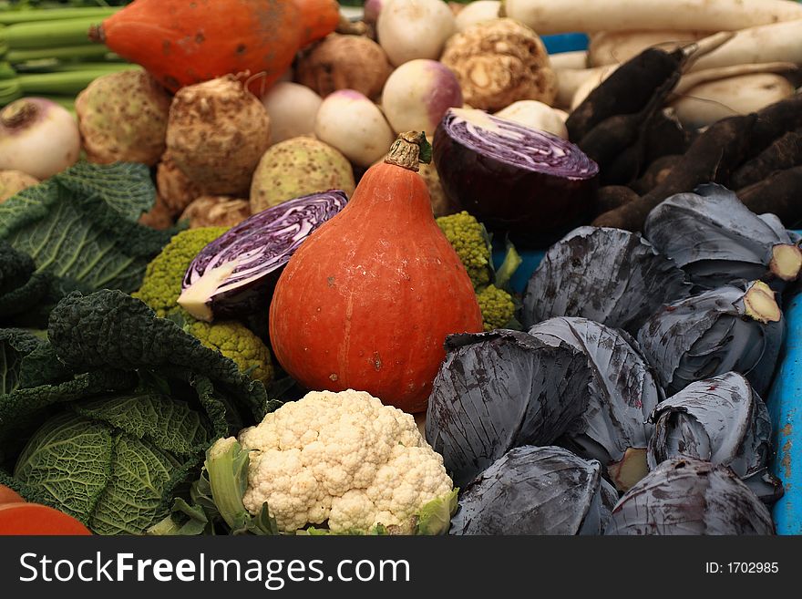 Display of colorful vegetables at a market stall