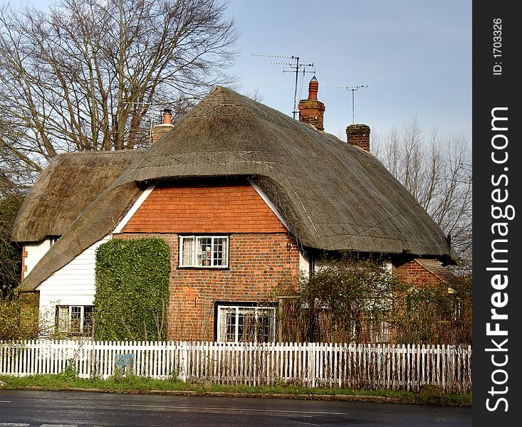 Thatched Village Cottage on a Village Street in England