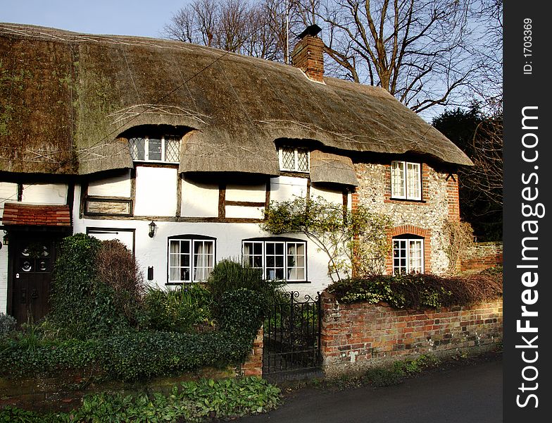 Timber Framed Thatched Village Cottages on a Village Street in England