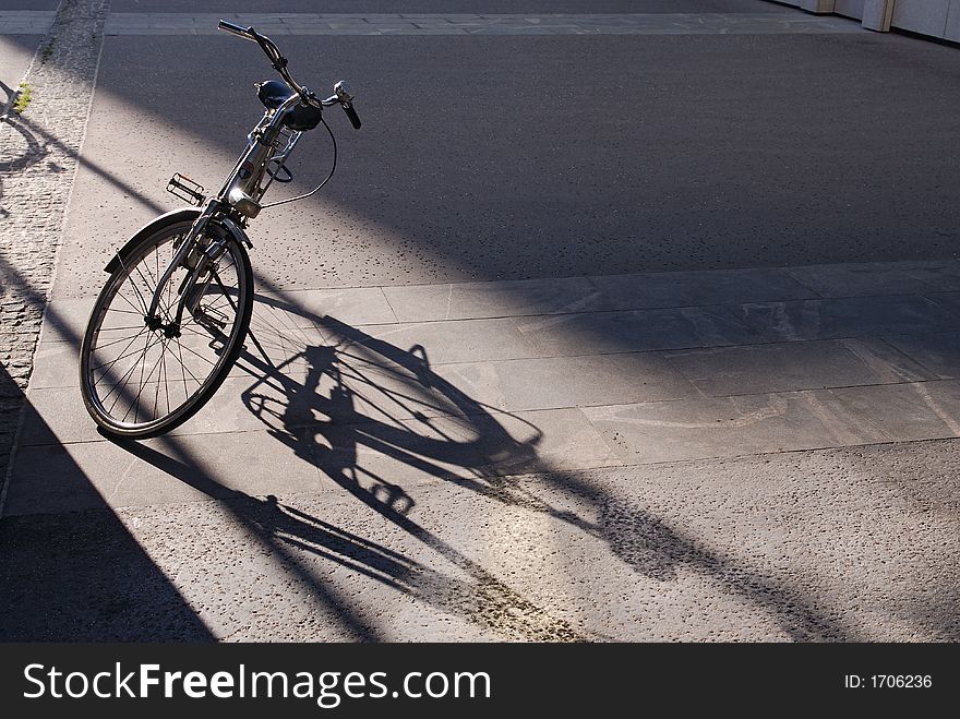 Left bicycle and the shadow
