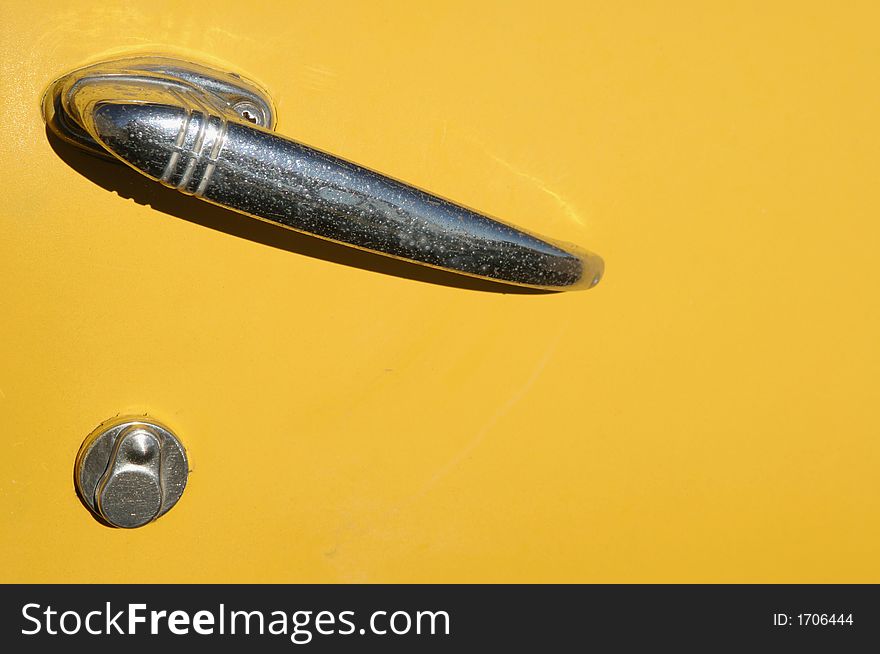 Chrome door handle and key hole on a 1950 Dodge. Chrome door handle and key hole on a 1950 Dodge