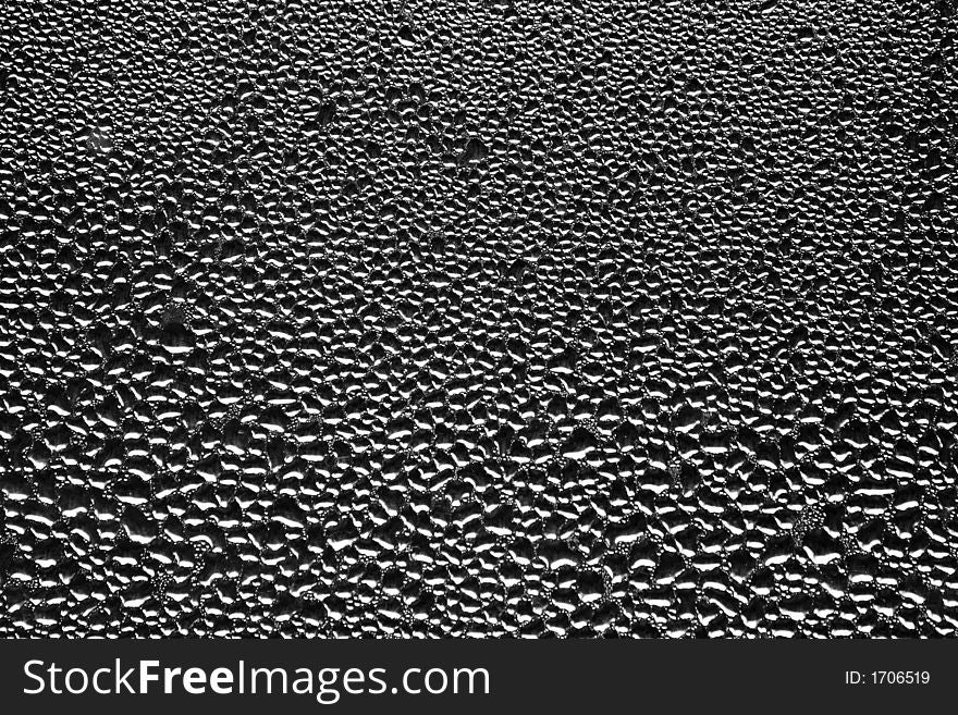 Drops of water on the glass [greyscale]. Drops of water on the glass [greyscale]
