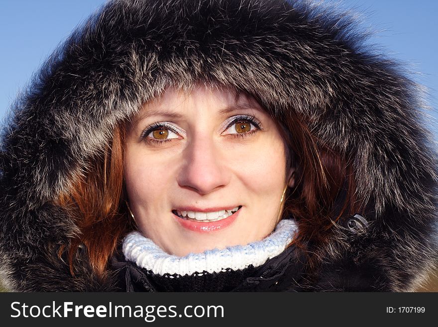 Portrait of woman in winter hooded coat. Portrait of woman in winter hooded coat