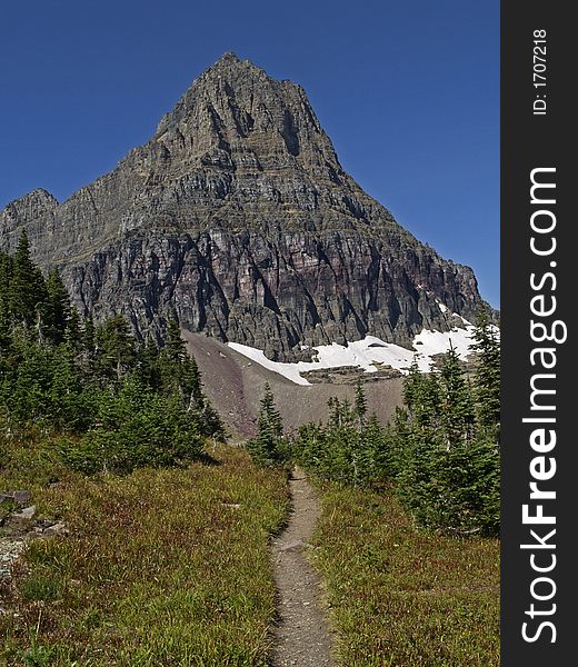 This image of the trail and the majestic mountain in the background was taken in western MT. This image of the trail and the majestic mountain in the background was taken in western MT.