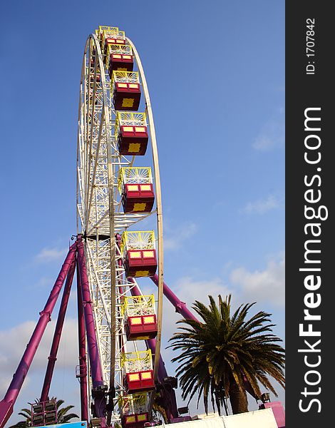 Colorful large carnival ferris wheel