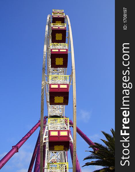 Colorful large carnival ferris wheel