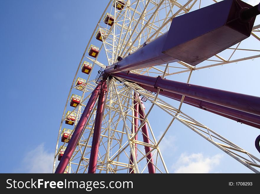 Colorful large carnival ferris wheel