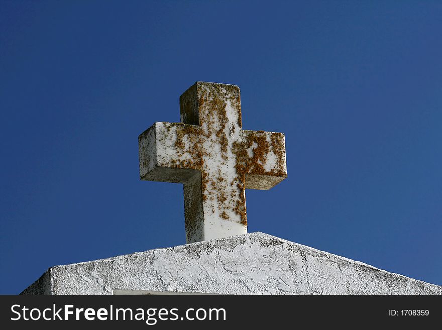 Cross on top of a tomb. Cross on top of a tomb