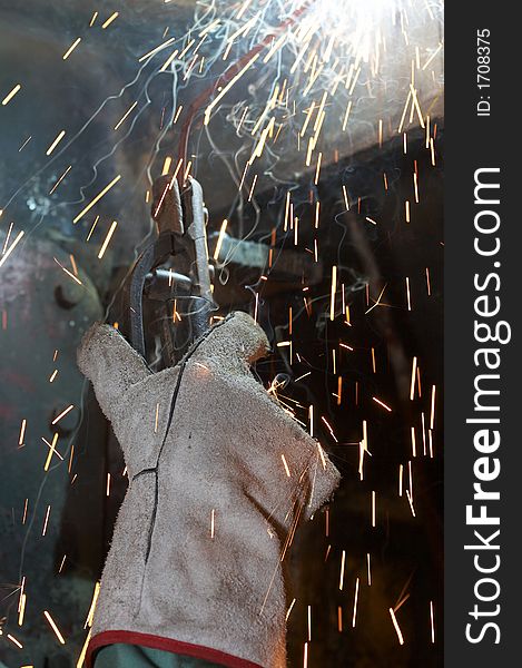 Welder working view close up of hand. Welder working view close up of hand