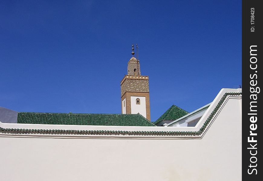 Palace wall in rabat morocco over looking roof tops and minaret