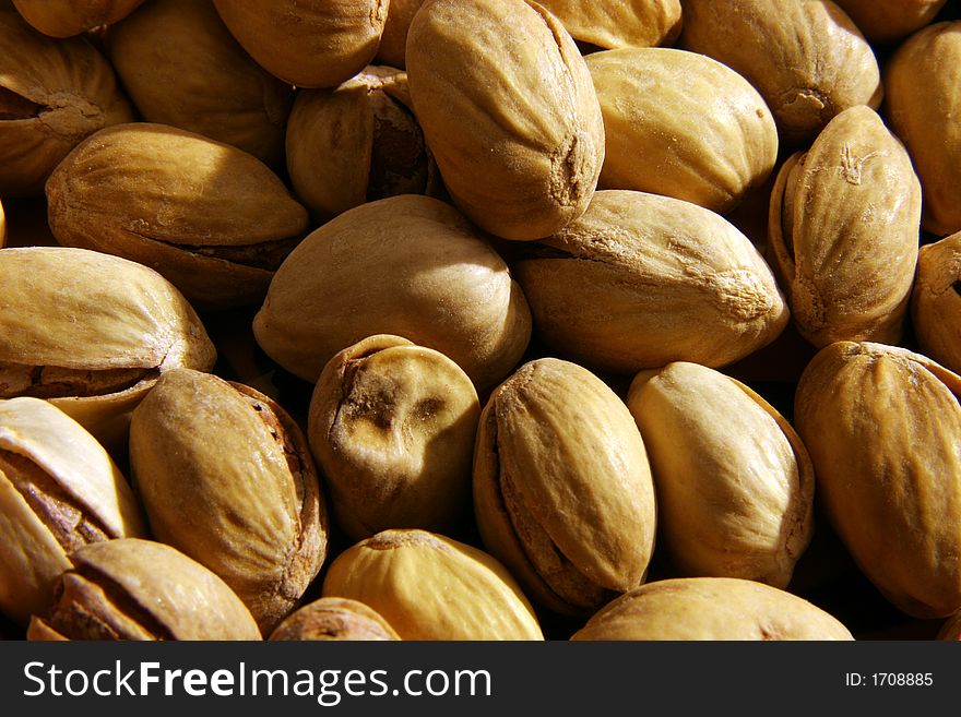 Pistachio nuts close up, salted