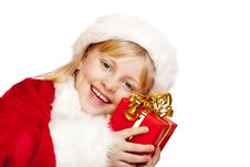 Young Santa Claus Girl Holds Christmas Gift Stock Image Young Santa Claus Girl Holds Christmas Gift Stock Image