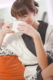 Woman In Bathrobe Drinking Tea Stock Images Woman In Bathrobe Drinking Tea Stock Images