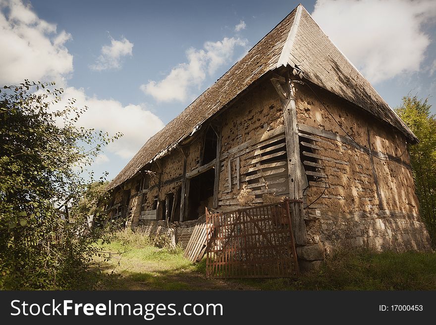 A dilapidated barn or farm out-house in France. A dilapidated barn or farm out-house in France