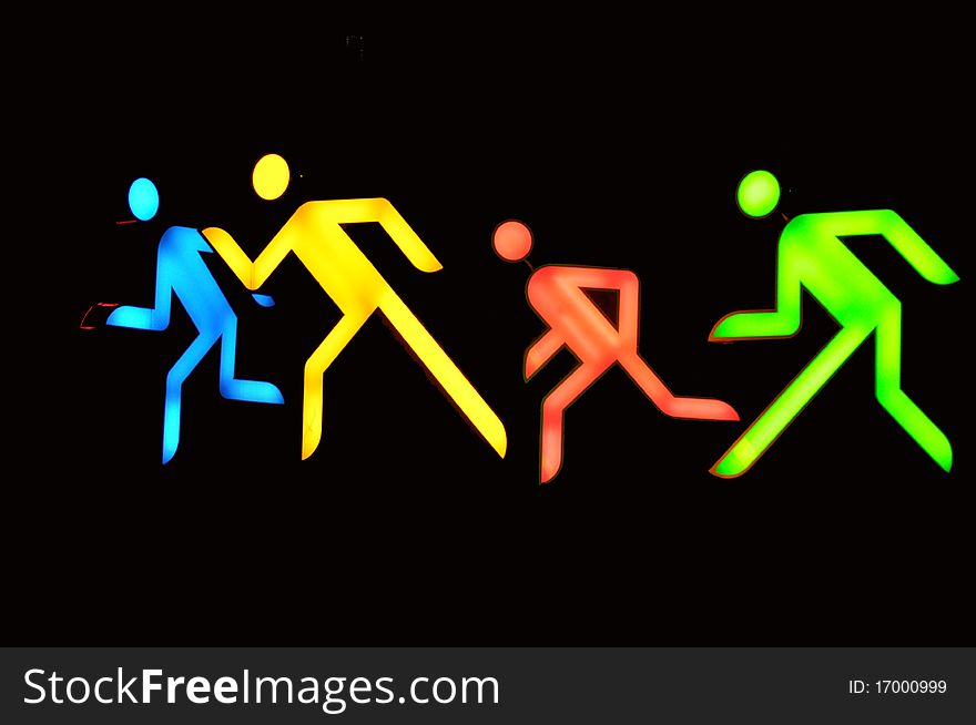Various colored neon signs pictogram running man
