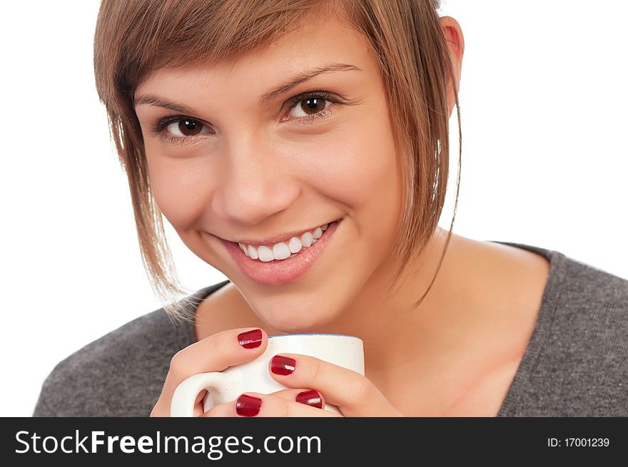 Portrait of a happy beautiful teenage girl holding a cup. Portrait of a happy beautiful teenage girl holding a cup