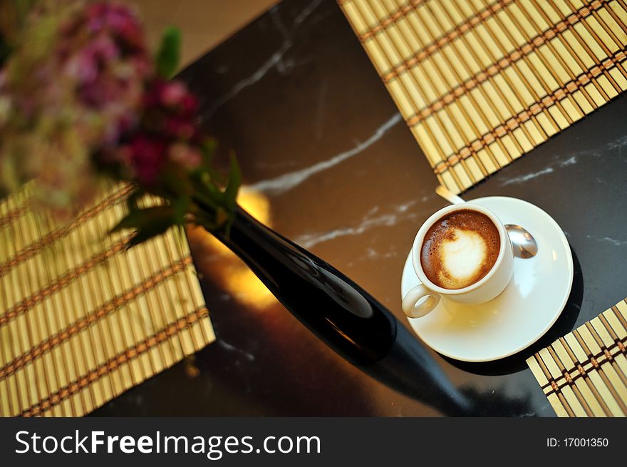 A cup of coffee can be seen in an Italian restaurant in Bucharest, Romania.