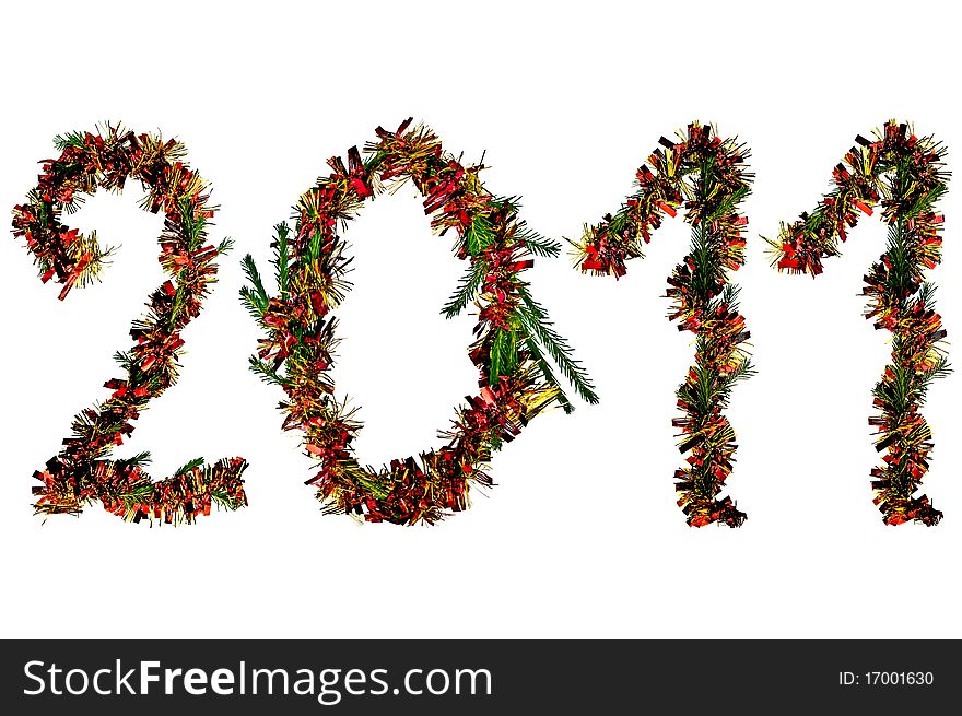 The number of two thousand and eleven of fir branches, red and gold tinsel isolated on a white background. The number of two thousand and eleven of fir branches, red and gold tinsel isolated on a white background